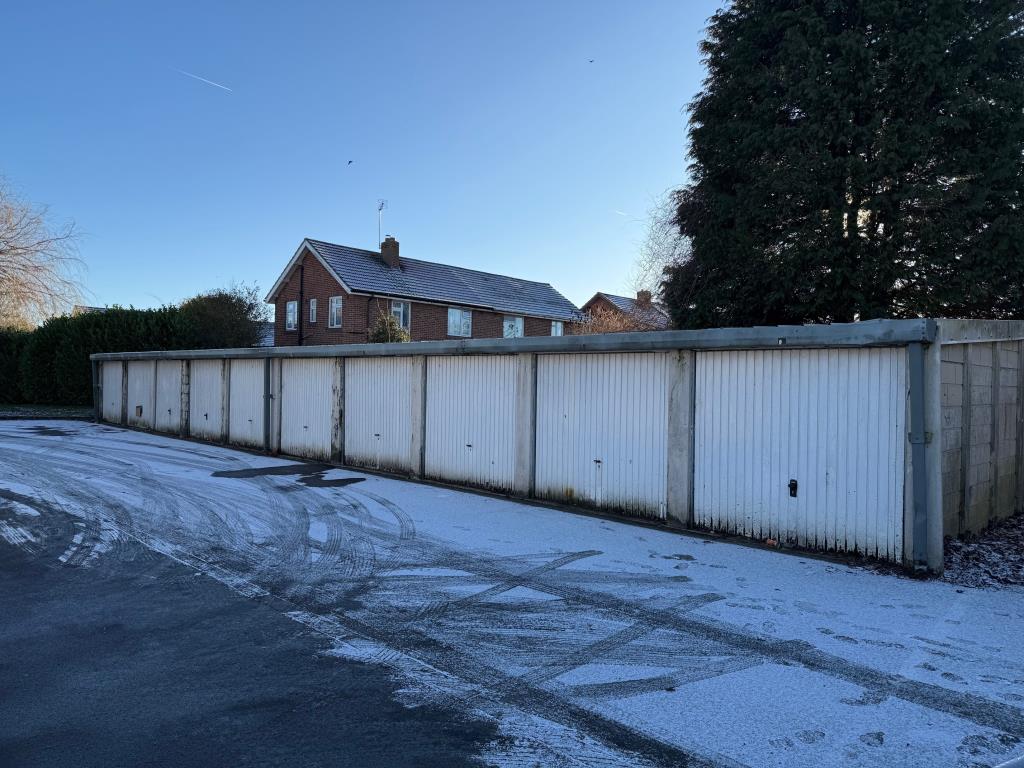 Lot: 4 - TEN LOCK-UP GARAGES - Reverse angle of ten lock up garages